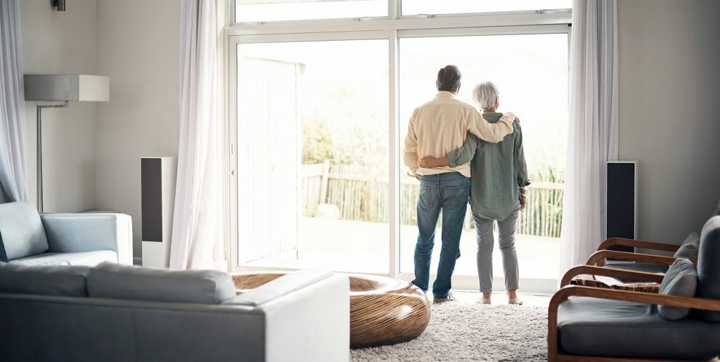 older couple looking out window, medicare