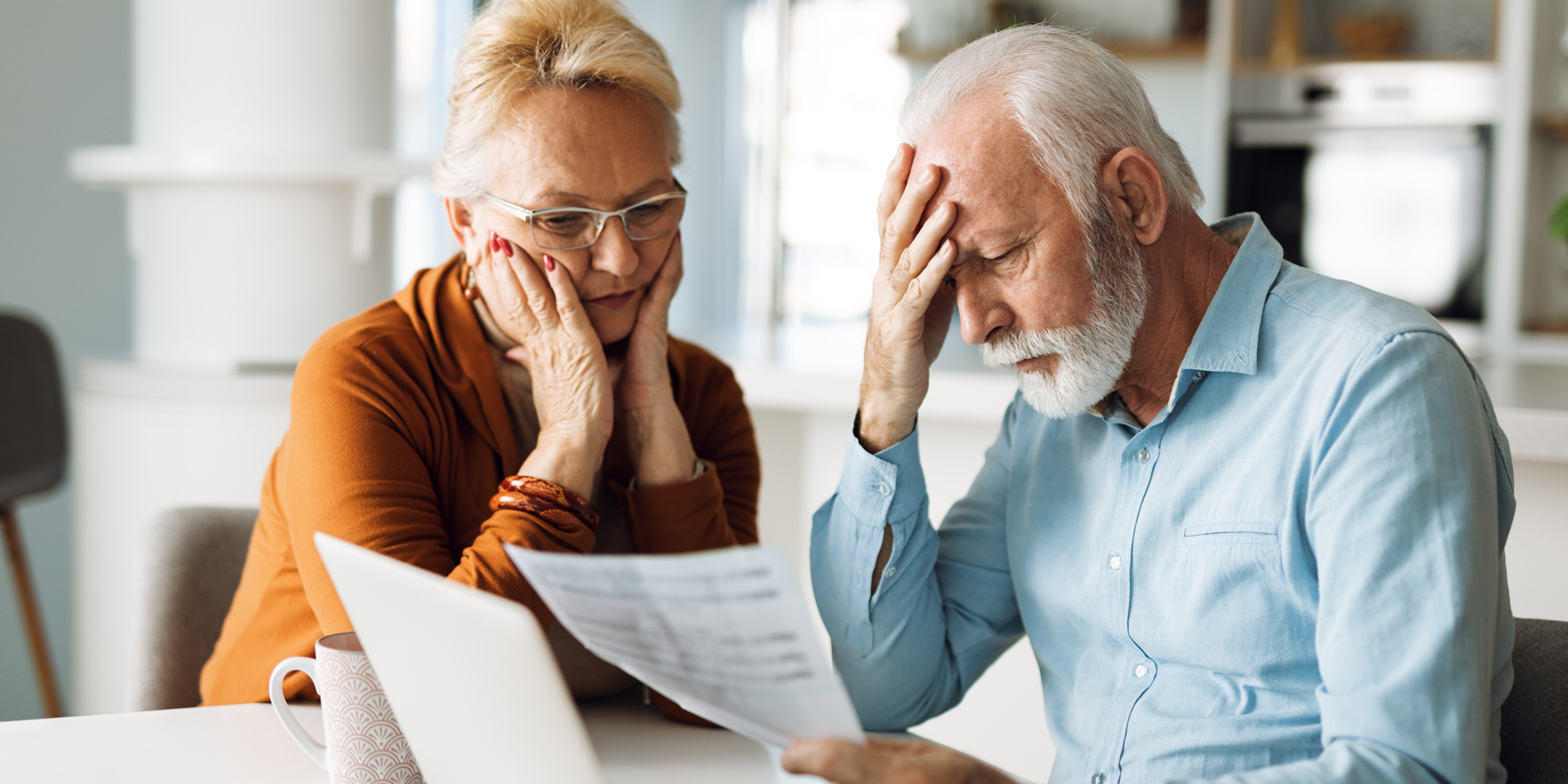 couple stressed over retirement, asset allocation, financial advisor