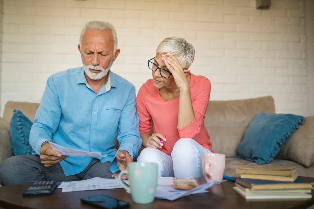 retirement risks for seniors, Senior couple having a hard time at home